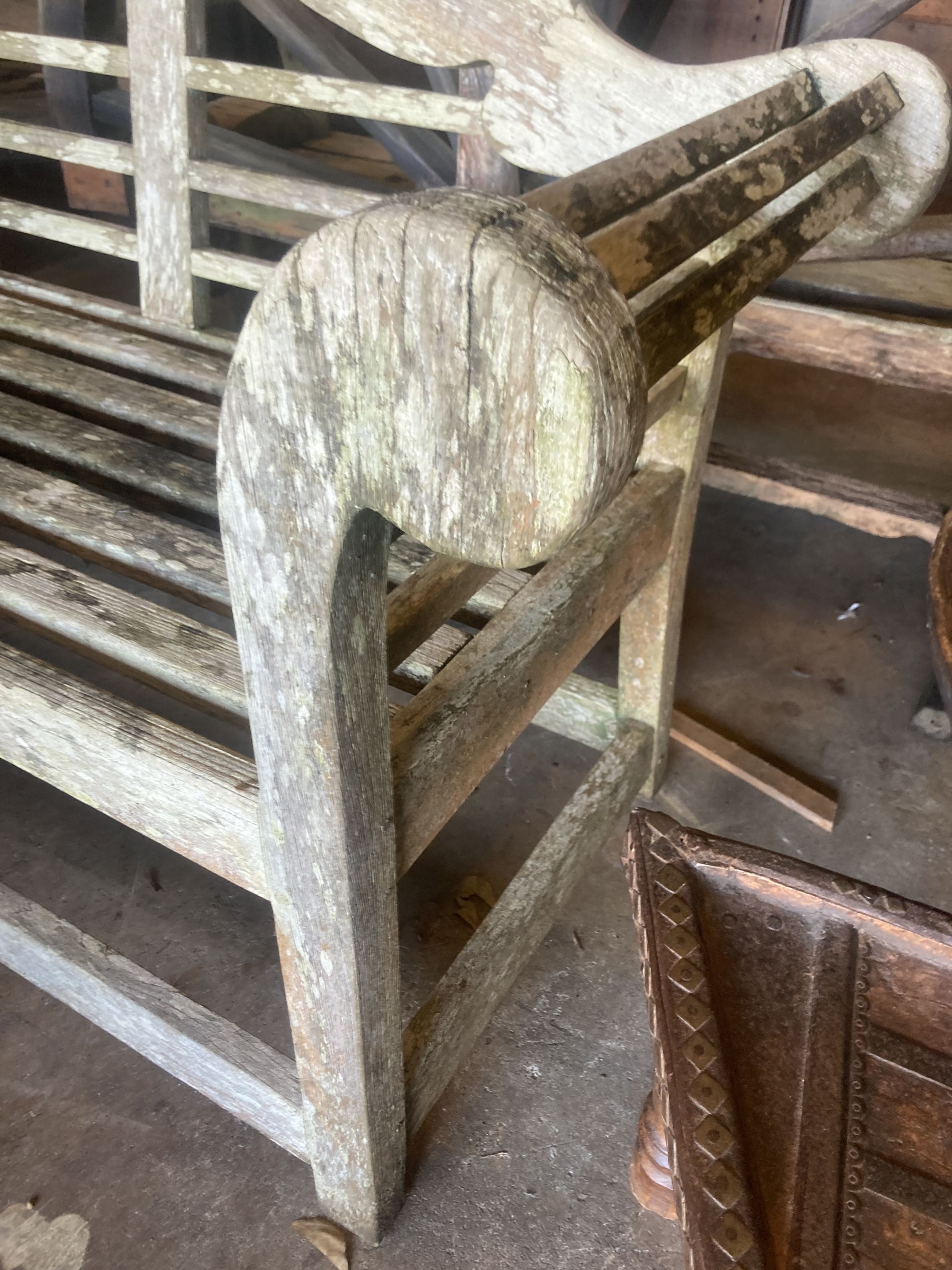 A vintage Lutyens design weathered teak garden bench, width 196cm depth 50cm height 106cm